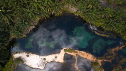 Tadom Hill beautiful crystal clear emerald pool during sunrise