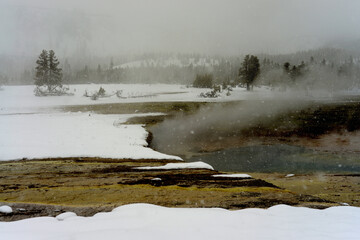 Winter Snowing Geothermal Pool Yellowstone