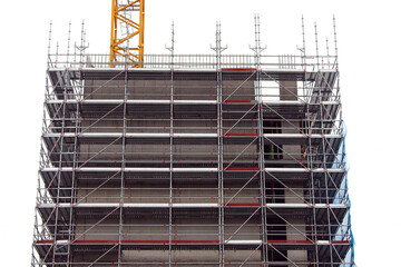 Modern home of office building construction with scaffolding. White background. New house...