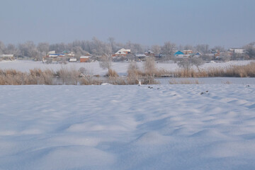 winter village across the river