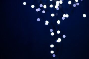 abstract Christmas lights background on blue