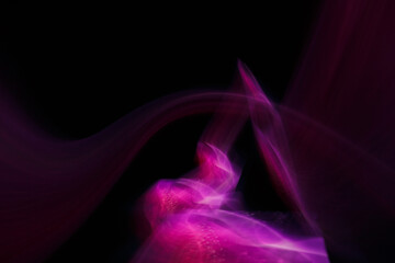 Abstraction of lines of colored blurred light.
