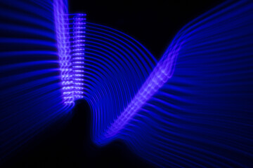 Abstraction of lines of colored blurred light.