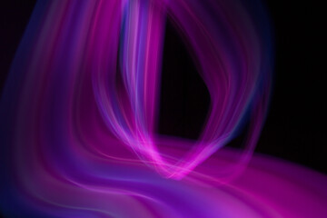 Abstraction of lines of colored blurred light.