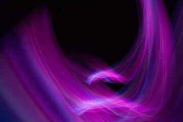 Abstraction of lines of colored blurred light.