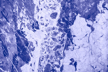 Marble nature texture made as if performed by fluid art technique. The drawing includes swirls of marble. Trendy color of 2022.