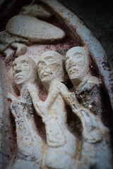 Romanesque sculpture of three knights
