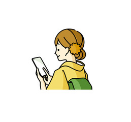 スマートフォンを使っている着物姿の女性