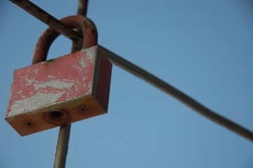 love padlock locked on reinforced steel on high building ., in winter time, Valentines Day card concept