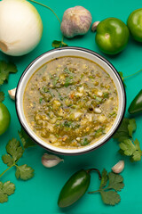 Green hot sauce with jalapeno pepper. Mexican food