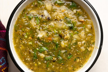 Green hot sauce with jalapeno pepper. Mexican food