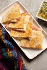 Ham and cheese quesadilla with flour tortilla. Mexican food