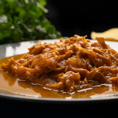 Chicken tinga with chipotle sauce. Mexican food