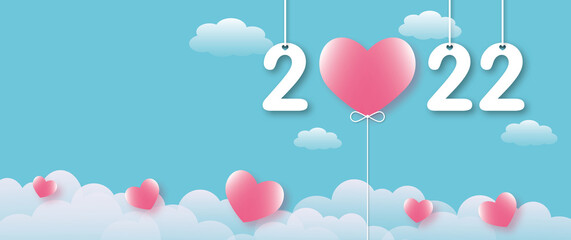 Plakat Many pink hearts with year 2022 on blue sky background. Greeting card for Valentine, Wedding, Mother's, Father's day, birthday, poster or postcard, love concept. copy space. paper art design style.