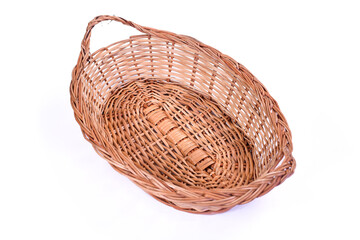 Obraz premium Empty wicker basket isolated on white background