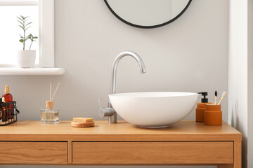 Naklejka na ściany i meble Beautiful interior of modern bathroom with sink