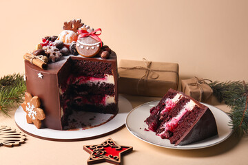 Composition with tasty Christmas chocolate cake on beige background