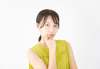 Fototapeta premium 女性 考える 白背景