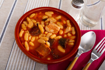 Tasty homemade stew of asturian beans with sausages. Traditional Spanish cuisine
