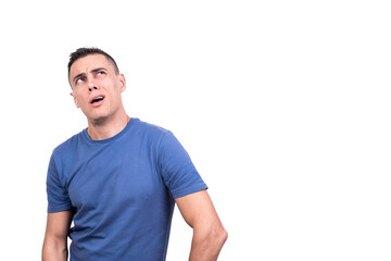 Fototapeta premium Man looking up with a doubtful expression