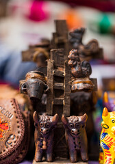 wooden ornaments in the shape of bulls