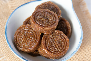 Rice dessert with brown sugar stirred in a mold (khao tu dessert) in a cup, Thai dessert
