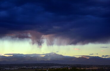 ominous afternoon virga  clouds over the front range of the colorado rocky mountains, as seen from...