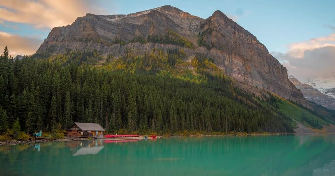 Time Lapse of Lake Louise, Canada, Clouds Above Water, Hill, Forest and Lodge in Banff National Park