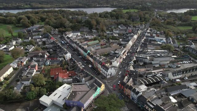 Kenmare, County Kerry, Ireland. Drone Aerial View of Small Town Buildings and Traffic on Sunny Autumn Day
