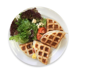 top view sausage waffles and vegetable salad on a ceramic plate on white background, food, health, nature, copy space