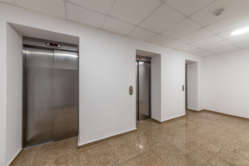 Obraz na płótnie Canvas Modern elevators in a business lobby, hotel or store. Interior of modern building.