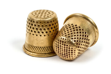Antique copper thimbles for sewing.