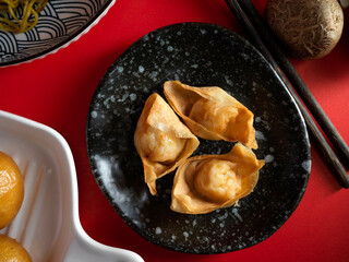 a Shrimp fried dumplings on a craft plate