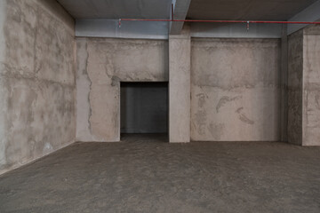 Fototapeta na wymiar Unbuilt concrete warehouse interior space