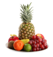 Naklejka na ściany i meble Plate with fresh ripe fruits on white background