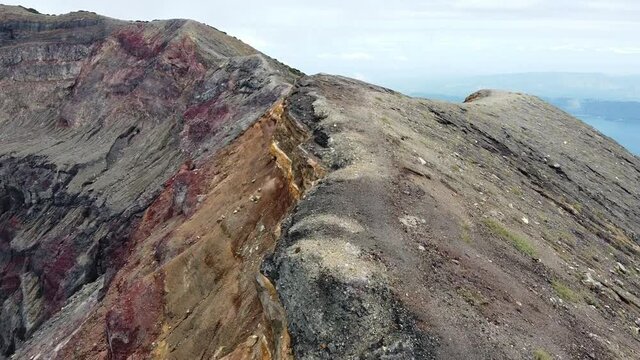 Flying over a volcano side. 