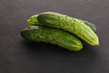 Fersh juicy green cucumbers heap