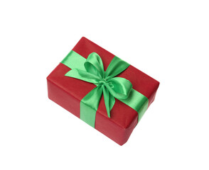 Red gift box with green bow isolated on white