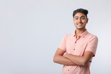 Young indian man giving expression on white background.