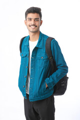 Young indian college student giving expression on white background.