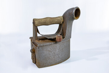 Ironing iron on white background, vintage