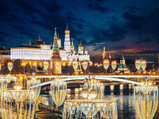 Moscow Kremlin. Russia Christmas. New Year cityscape of Moscow. Great Kremlin Palace on winter night. Lanterns on roads of Moscow are decorated with Christmas garlands. Christmas Russian Federation.