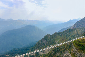 Hanging rope bridge for extreme walking in the mountains 