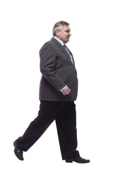 business man confidently striding forward . isolated on a white