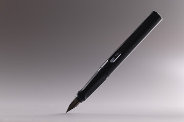 Black feather pen, sharp tip, tool for writing, refill ink container