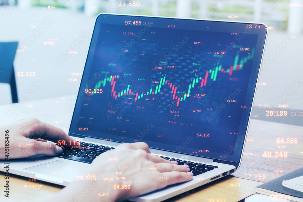 Aufkleber Close up of businessman hands using laptop computer with abstract candlestick forex graph and bid data numbers on blurry desktop background. Finance, technology, analytics and trade concept. 