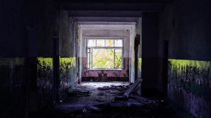 Fototapeta na wymiar old abandoned premises, ruin. empty territories, abandoned houses. concept of war, Chernobyl disaster, apocalypse. brick buildings. sad view, heavy atmosphere. desolation and destruction of the abode