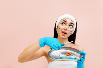 Portrait of a thoughtful young woman in medical gloves choosing syringes from medical kidney dish....