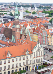 Naklejka premium Wroclaw, Poland - largest city of Silesia, Wroclaw displays a colorful Old Town. Here in particular a sight of it from the top of St Elizabeth Church