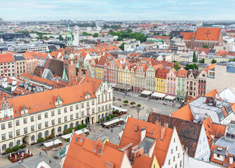 Fototapeta na wymiar Wroclaw, Poland - largest city of Silesia, Wroclaw displays a colorful Old Town. Here in particular a sight of it from the top of St Elizabeth Church